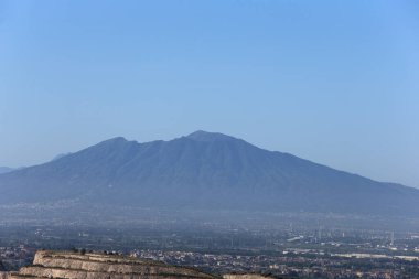 Caserta, Italy - June 14, 2024. Panorama of Vesuvius seen from Casertavecchia clipart