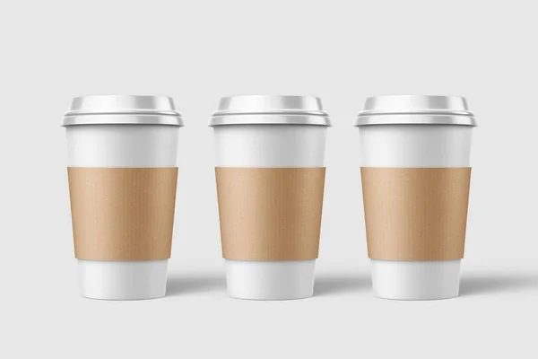 三个纸杯咖啡与袖子模型模板 隔离在浅灰背景 高分辨度 — 图库照片