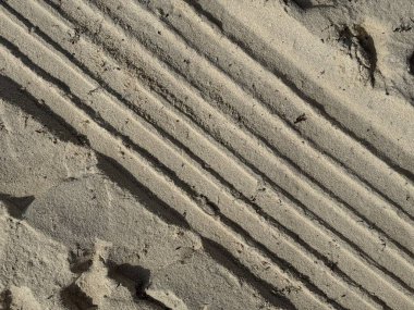 Arka plan olarak lastiklerden gelen kumda rahatlama.