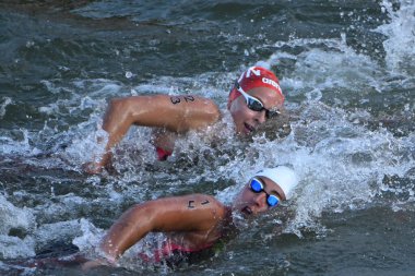 PARIS - FRANCE, August 8, 2024 - Paris Olympic Games, Seine River Aquatic Marathon in Paris, the controversial aquatic marathon on the Seine River in Paris, ended up being held, even with suspicions of pollution of the Seine water clipart