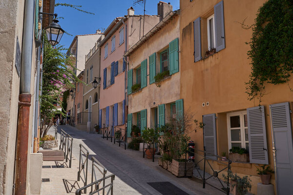 Saint Tropez, France - August 8, 2022 - the narrow streets and squares of the world-famous French town on a summer afternoon                               