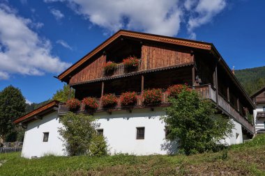 Sesto-Sexten, Italy - September 19, 2022 - The charming village of Sexten/Sesto is nestled in the striking mountain world of the Sexten Dolomites                               