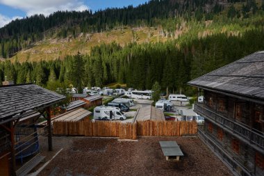 Sexten - Sesto, Italy - September 18, 2022 - Caravan Park Sexten - between tradition and modernity                               