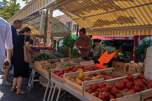 Nice, France - August 12, 2023 - the market stalls at the Cours Saleya in Nice, one of the most lively places in the city                                
