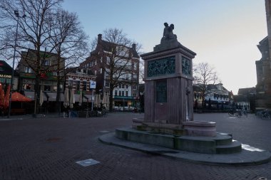 Enschede, Netherlands - January 28, 2024 - Oude Markt - the Old Marketplace square on a winter morning                                clipart