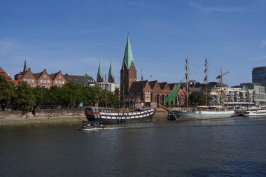 Bremen, Germany - September 1, 2024 - Riverside view of the Schlachte promenade on a sunny summer day                                clipart