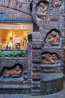 Bremen, Germany - September 1, 2024 - Bttcherstrae, the famous street with unusual architecture in the historic centre on a sunny summer day                                clipart