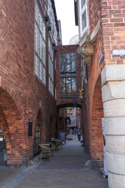 Bremen, Germany - September 1, 2024 - Bttcherstrae, the famous street with unusual architecture in the historic centre on a sunny summer day                                clipart