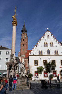 Straubing, Germany - October 12, 2024 - the Holy Trinity Column in the Theresienplatz in the city centre                                clipart