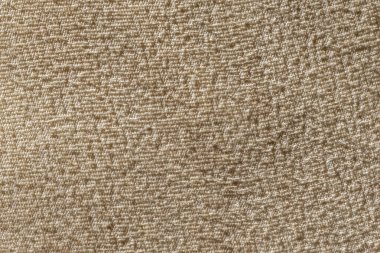 Texture of light woven fabric, close-up.