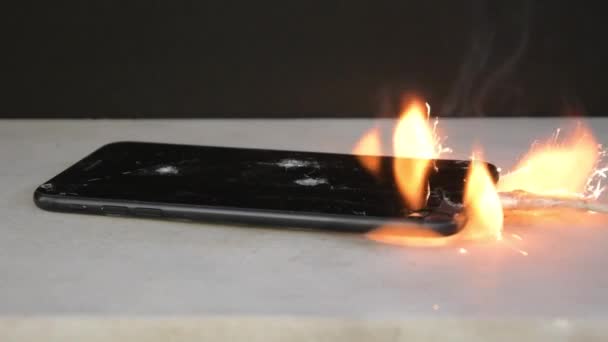 Smartphone Black Background Overheats Ignites Sparks Smoke Fly — Stock Video