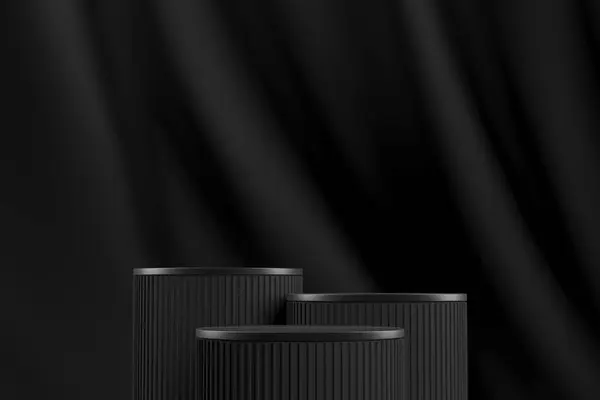 Drie Zwarte Cilindrische Pallet Een Zwart Fluwelen Gordijn Achtergrond Abstracte Stockfoto