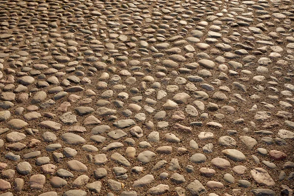 Estrada Pavimentada Com Pedras Como Fundo — Fotografia de Stock