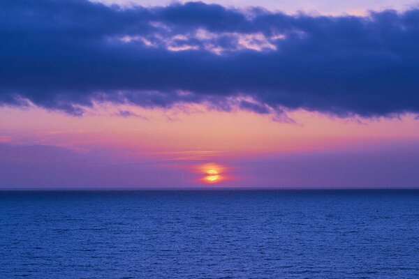 Colorful sunrise on the coast of Gran Canaria.