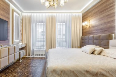 Luxury bedroom interior with parquet and marble walls