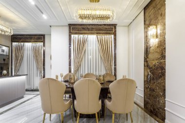 Marble dining table with utensil in a rich house
