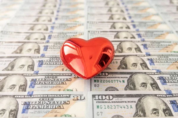 Love and money concept. Heart and American currency close up. valentine's day, love of money