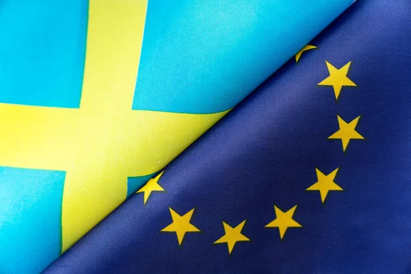 Flags European Union and sweden. The concept of international relations between countries. The state of governments.