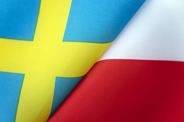 スウェーデンとポーランドの国旗 国家間の国際関係の概念 政府の状態 人々の友情 — ストック写真