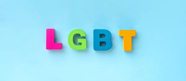 Word lgbt in single letters on blue background