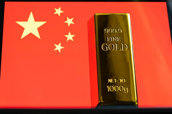 The gold bar is on the national flag of china, chinese Gold Reserve concept