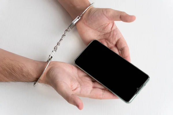 Handcuffs Man Hands Mobile Phone Concept Addiction Phone Fraudster Handcuffs — Stock Photo, Image