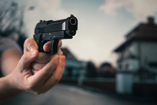 Man Hand Holding Pointing Gun Finger Trigger Street Crime Concept — Stock Photo, Image