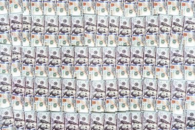 Paralı arka plan Amerikan 100 dolarlık banknotlar. Arka planda bir sürü Amerikan doları var..