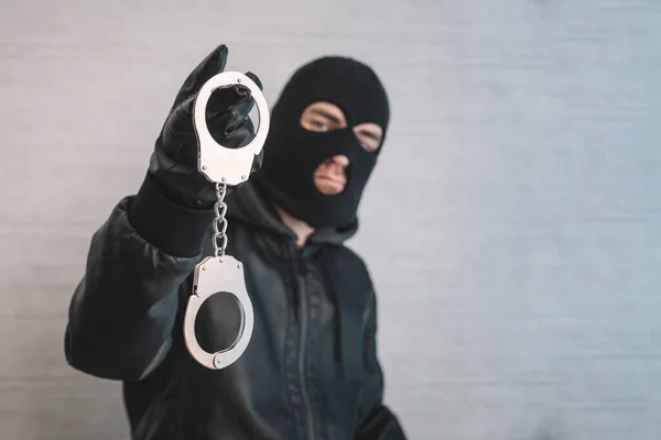 Bandit Black Mask Gloves Handcuffs His Hands White Background Release — Stock Photo, Image