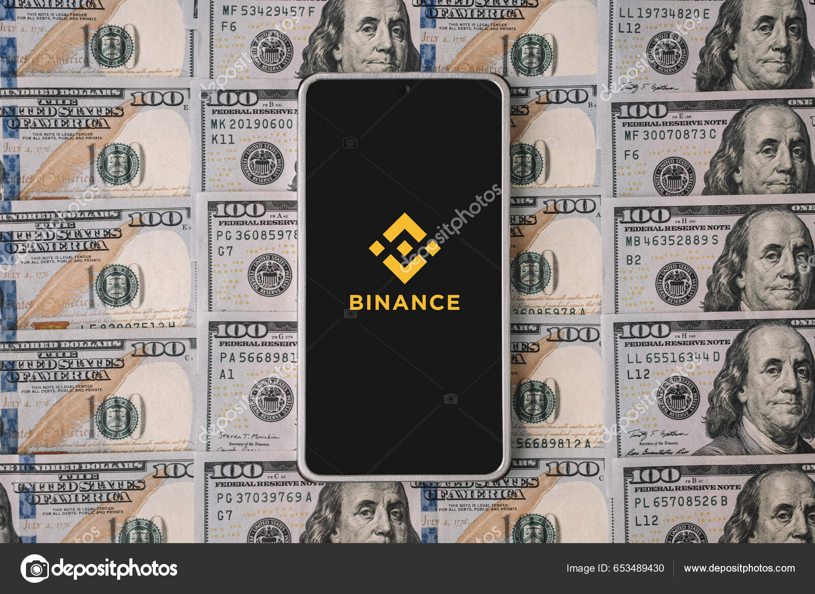전화와 바이너리 로고와 달러입니다 Binance 암호화 교환이다 2023 러시아 — 스톡 에디토리얼 사진 © diy13@ya.ru  #653489430