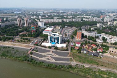 new embankment on the bank of the Irtysh river in the city of Pavlodar, Kazakhstan. top view from the drone from above clipart