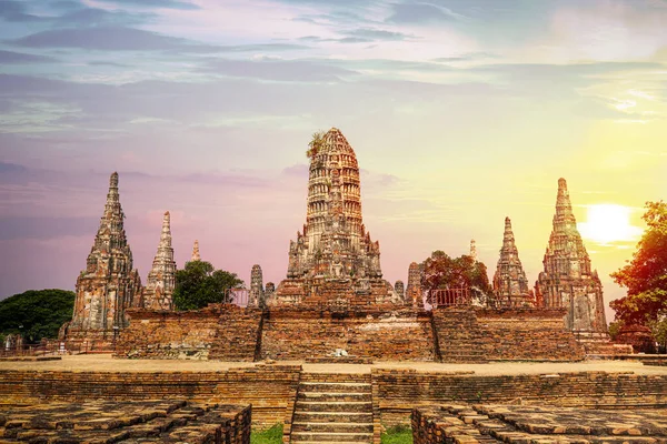 stock image Ruined pagoda with surrounded by lion sculptures in Wat Thammikarat Ayutthaya, Thailand