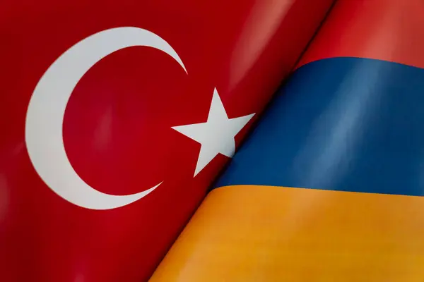 Background of the flags of the Turkey, armenia. The concept of interaction or counteraction between the two countries. International relations. political negotiations. Sports competition.