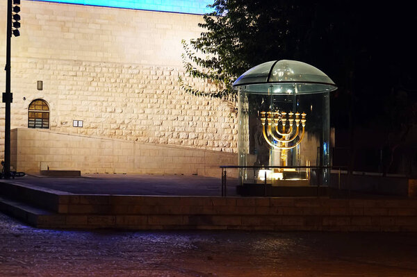 near the seven-branched candelabrum near the synagogue Hurva at night . The Old City of Jerusalem, Israel,