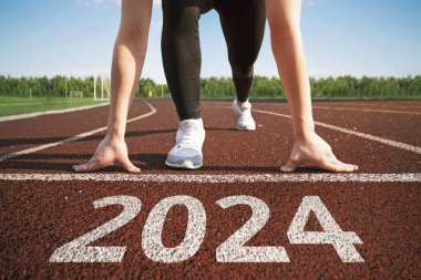 Yeni yıl 2024 'ün kutlu olsun. Yeni yılda bir iş ya da kariyer kurma kavramı. Kadın koşuya hazırlanıyor. 2024 yılının başında. Yeni bir seviye konseptine geçiş. 2024 'te umut ve beklenti