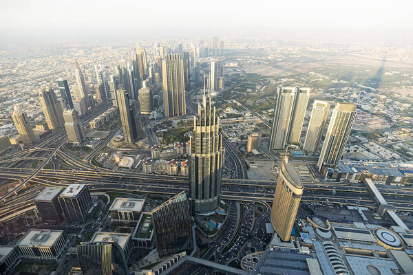 Aerial view of Downtown Dubai with Dubai Fountain and skyscrapers from the tallest building in the world, Burj Khalifa, at 828m