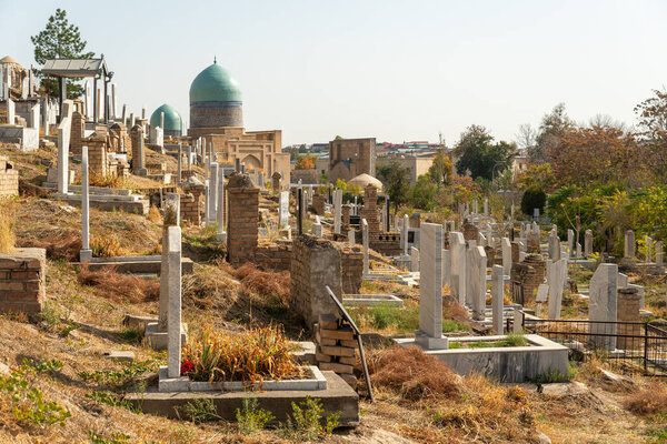 An ancient Muslim cemetery with old and new graves. no inscriptions on the tombstones. Samarkand, Uzbekistan.