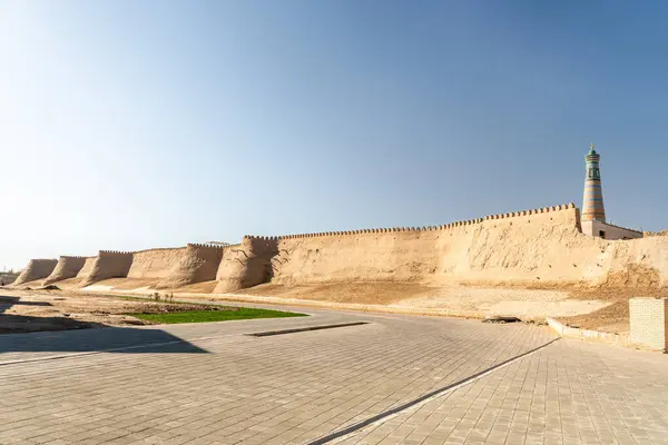 Outer walls of Ichan-Kala, inner city of Khiva (Uzbekistan), its historical center. Height of walls, excluding base, reaches 10 meters, thickness is up to 8 m