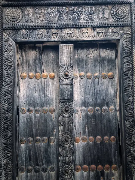 carved wood door in fort jesus mombasa , Kenya