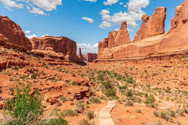 stock image Park Avenue Trailhead in Arches National Park in Moab, Utah, United States. Massive Natural Sandstone Monuments Called Courthouse Towers