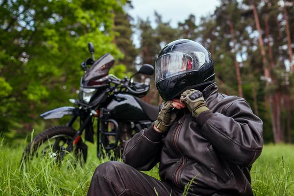 Close Biker Unfastening Helmet Riding Motobike Summer Forest Man Wearing — Stock Photo, Image