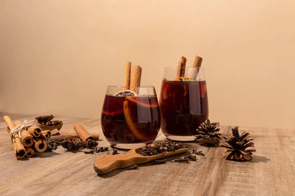 stock image Christmas drink Vin Chaud, French mulled wine ingredients_cinnamon and dried fruits