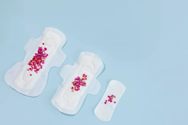 woman menstrual products, compare sanitary pad size