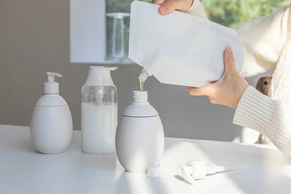 stock image eco friendly habits hand gesture, using refill container