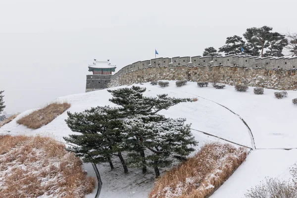 stock image beautiful snowing winter scenery in Suwon Hwaseong Fortress trail in Korea