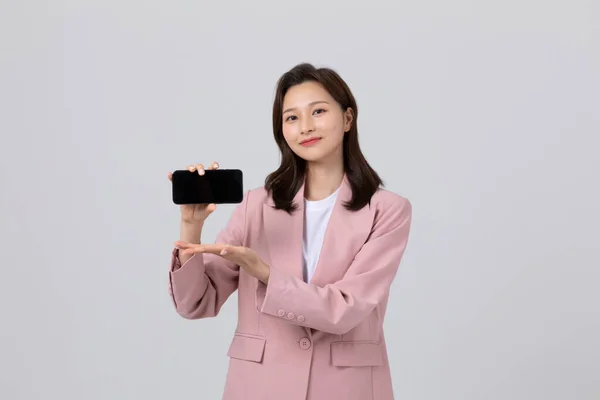 Business Concept Korean Young Woman Holding Smartphone Studio Shot — Stock Photo, Image