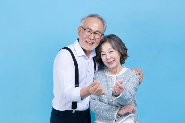 Aktywny Młody Seniorzy Koreański Azji Para Ręka Ruch — Zdjęcie stockowe