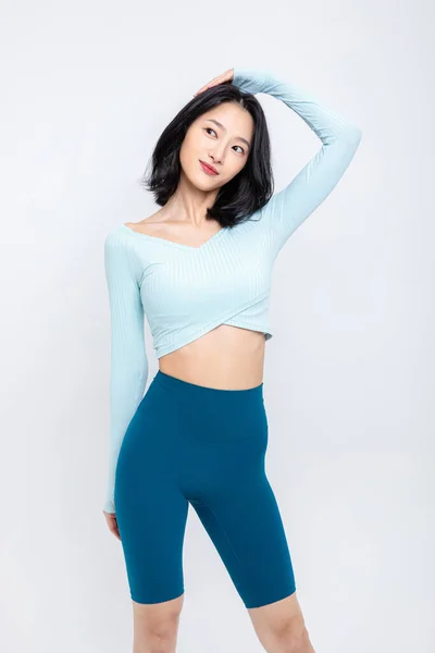 healthy beauty concept photo of korean asian beautiful woman stretching