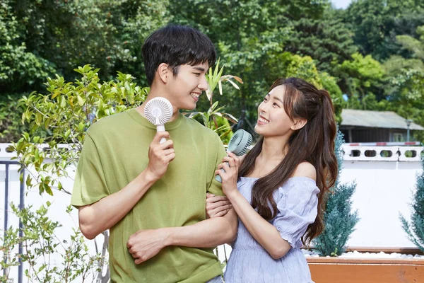 Summer Lifestyle Korean Asian Young Couple Enjoying Electric Fan Outdoor —  Fotos de Stock