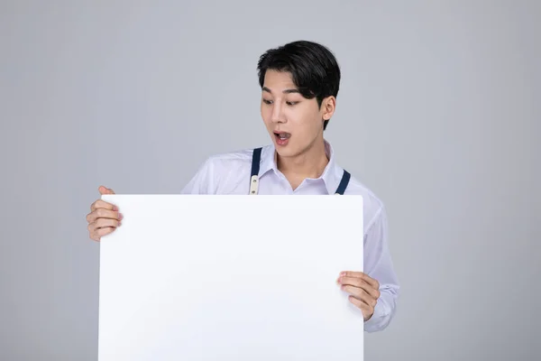 Koreanisch Asiatisch Jung Mann Holding Ein Rahmen Paneel — Stockfoto